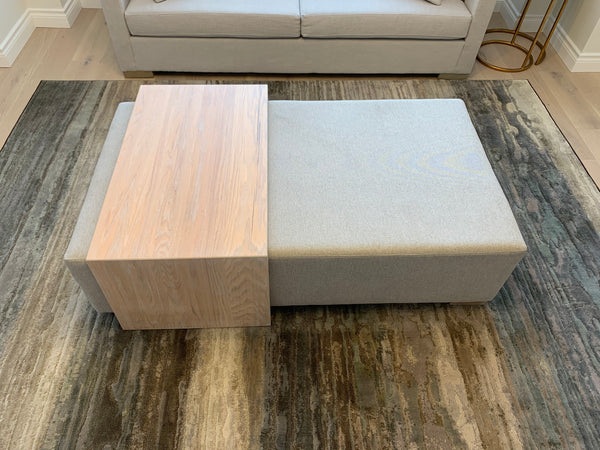 Ottoman with solid Oak coffee table to the left